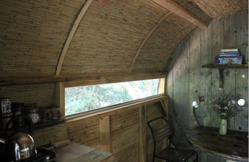 Ash Cabin | Serene Grain Store Yurt: Off-Grid Relaxation in Somerset