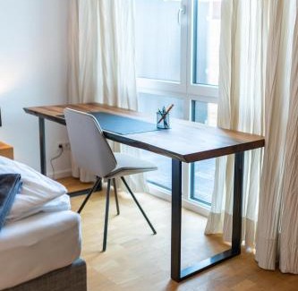 Holzgerlingen Apartment | Modern Comfort with Kitchen & Home Office Amenities