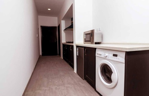 Masaki Apartment | Relax in 1BR Apartment with Pool, Gym & Free WiFi