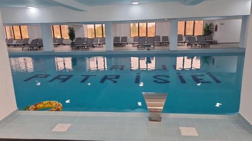 Cartisoara Hotel | Discover Hanul Patrisiei: Oceanfront Retreat with Pool