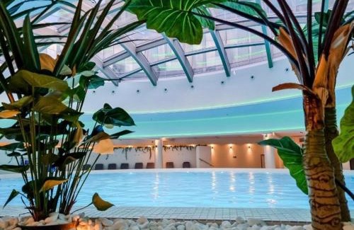 West Pomeranian Voivodeship Apartment | Hanza Tower: Inviting Pool, Hot Tub & Relaxing Sauna