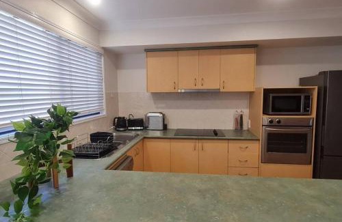 Eight Mile Plains House | Discover Happy Haven: Family-Friendly Retreat with Pool