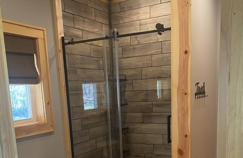 Burkesville Cabin | Discover Happy Hollow Hide Away: Cabin for 20 with Hot Tub