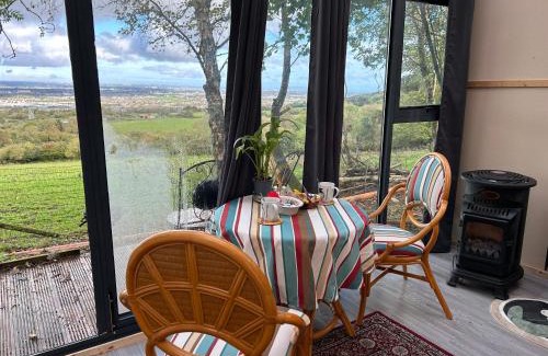 Brittas House | Cozy Happy Land Cabins with Hot Tub & Pet-Friendly Perks