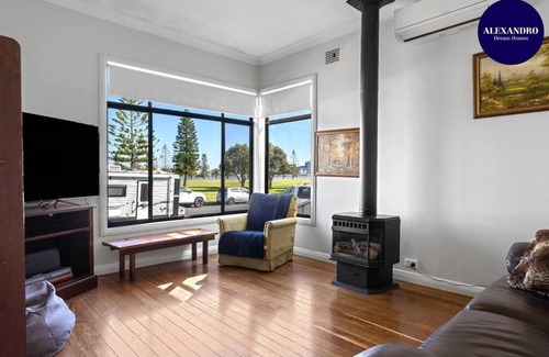 Stockton House | Harbour-Front Retreat in Stockton NSW with Family Amenities