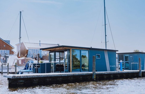 Municipality of Uitgeest Boat Rental | Inviting Houseboat Retreat at the Marina with Breakfast