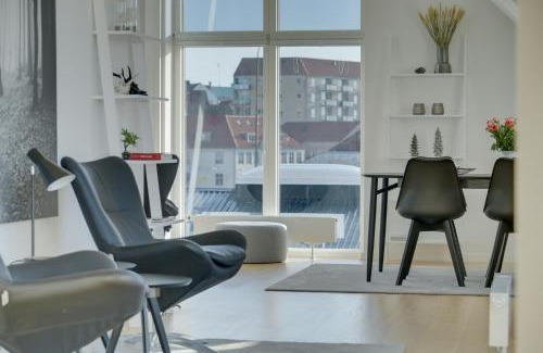Sønderborg Apartment | Harbour Penthouse: 4-Star Retreat with 9/10 Guest Rating
