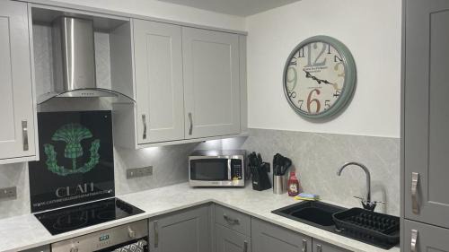 Wick House | Harbourside Holiday Home: Child-Friendly with Bike Storage