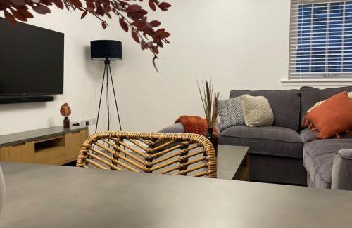 Wick House | Harbourside Holiday Home: Child-Friendly with Bike Storage