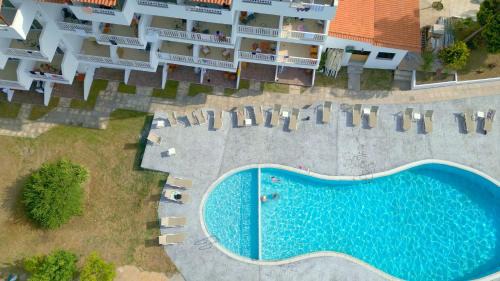 Haniotis Hotel | Discover Haris Hotel: Oceanfront Retreat with Pool & Spa