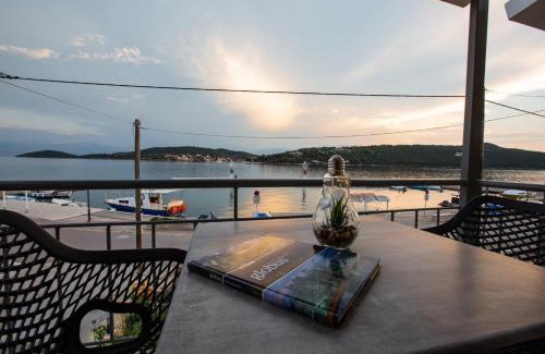 Dorida Apartment | Oceanfront Bliss at Haris Suites - Family-Friendly Retreat