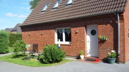 Klixbull Apartment | Discover Harksen Hüs: Family-Friendly with Hot Tub Access