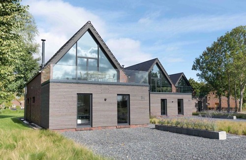Neufunnixsiel House | Modern Retreat at Harlepadd 3b with Family-Friendly Amenities