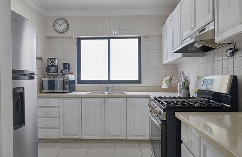 Ensanche Quisqueya Apartment | Elegant Harmony Penthouse Near Acropolis with Ocean Views