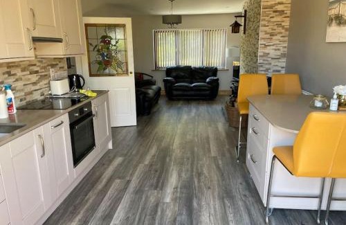 Tramore House | Inviting Harmony House: Beach & Lake Retreat for Families
