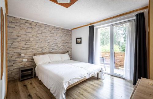 Ellmau House | Discover Hartkaiser Rooms and Apartments with Family Amenities