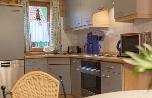 Rotacker Apartment | Cozy Log Cabin Retreat for 4 at Naturerlebnisdorf Blauvogel