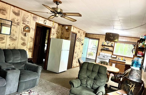 Neillsville Cabin | Hatfield Cabin: Waterfront Retreat with Hot Tub & Kitchen