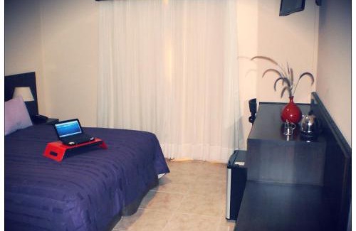 La Criolla Hotel | Discover Hathor Concordia: 4-Star Comfort with Hot Tub