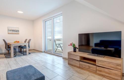 Loddin Apartment | Family-Friendly Haus Achterwasserblick FeWo 4 Awaits You
