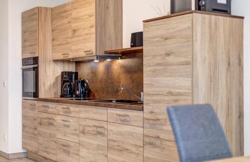 Loddin Apartment | Family-Friendly Haus Achterwasserblick FeWo 4 Awaits You