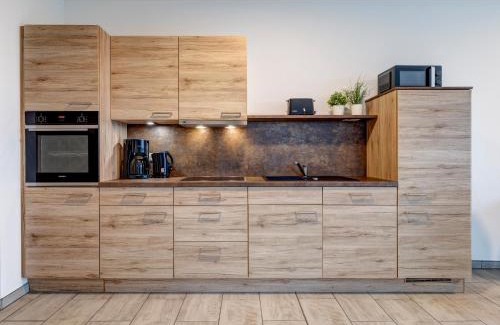 Loddin Apartment | Family-Friendly Haus Achterwasserblick FeWo 4 Awaits You
