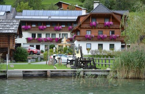 Weissensee House | Elegant Haus Binter: Oceanfront Retreat with Private Beach