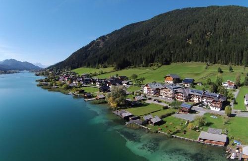 Weissensee House | Elegant Haus Binter: Oceanfront Retreat with Private Beach