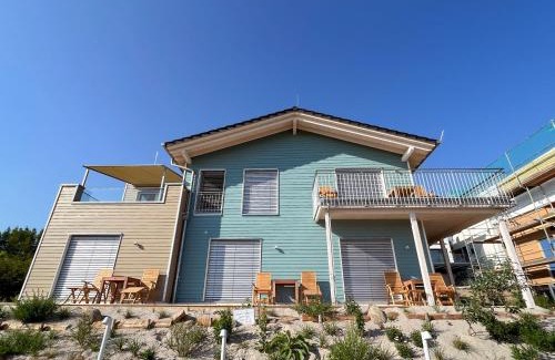 Lobstaedt Apartment | Oceanfront Retreat: HAUS IM SCHILF 2 at Hainer See