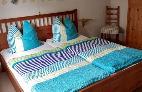 Ostersiel House | Cozy SÜNNECK Holiday Cottage with Oceanfront Views