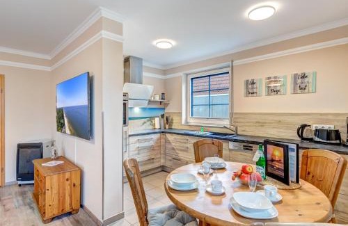 Trassenheide Apartment | Discover Haus Sonnenschein: Family & Pet-Friendly Retreat