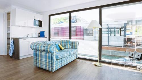 Braunsbedra House | Family-Friendly Floating House at Geiseltalsee for Memorable Stays
