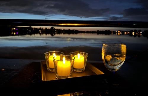Lathum Boat Rental | Experience Nature Aboard Hausboot KOMET with Ocean Views