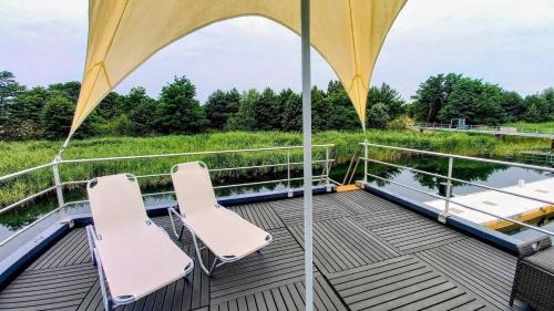 Vetschau/Spreewald Boat Rental | Tranquil Hausboot Milan - Unmatched Oceanfront Experience