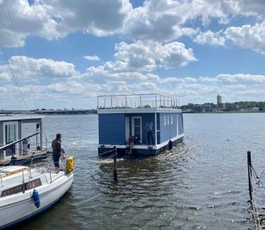 Luebeck House | Discover Hausboot Snowbird Lübeck with Inviting Sun Deck