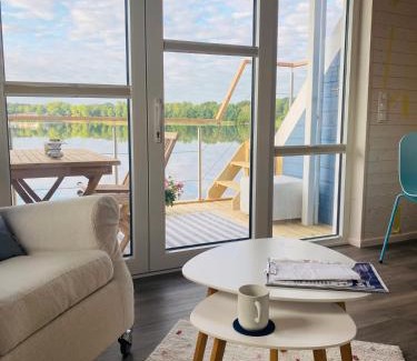 Luebeck House | Discover Hausboot Snowbird Lübeck with Inviting Sun Deck