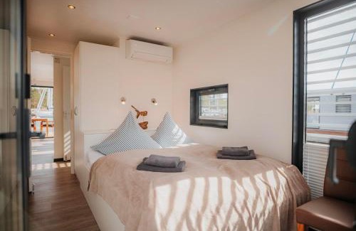 Peenemuende Boat Rental | Oceanfront Serenity at Hausboot Trinity - Perfect for Families