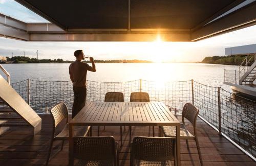 Rablinghausen Boat Rental | Discover Hausboote am Lankenauer Höft with Ocean Views