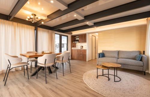 Rablinghausen Boat Rental | Discover Hausboote am Lankenauer Höft with Ocean Views