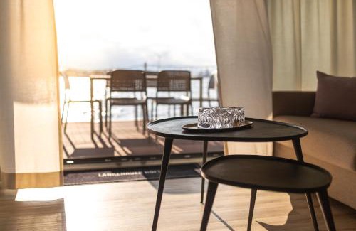 Rablinghausen Boat Rental | Discover Hausboote am Lankenauer Höft with Ocean Views