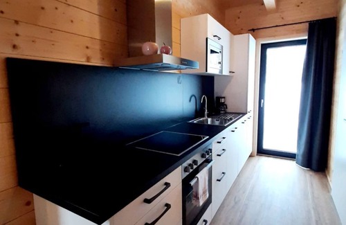Jenig House | Idyllic Alpenchalets by Interhome with Lake View & Spa