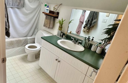 Brentwood Bay Other | Experience a Vibrant Macaw Farm Stay with Family-Friendly Perks