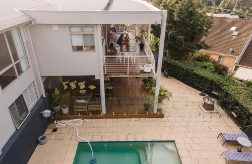 Corlette House | Haven 5: Pet-Friendly Retreat with Ocean Views & Pool