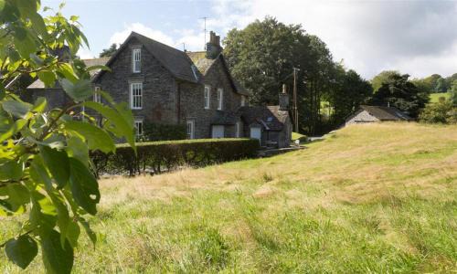 Hawkshead House | Elegant Hawkshead Hall: Pet-Friendly 4-Star Retreat