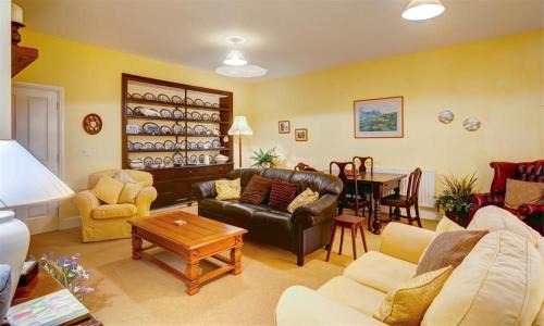 Hawkshead House | Elegant Hawkshead Hall: Pet-Friendly 4-Star Retreat