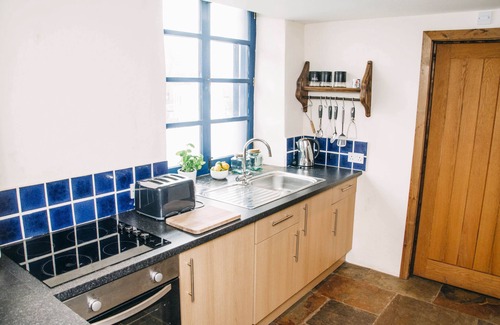 High Peak House | Charming Hay Barn Cottage at New Mills Marina Awaits You