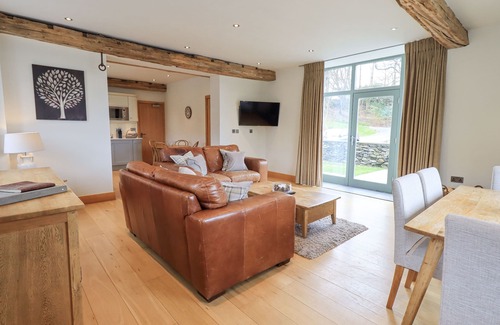 Penny Bridge Cottage | Family-Friendly Hazel Cottage with Spa & Hot Tub Retreat