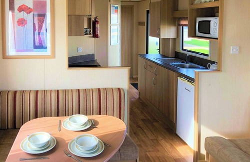 Chapel Saint Leonards House | Cozy Caravan with Oceanfront Views & Pool Access
