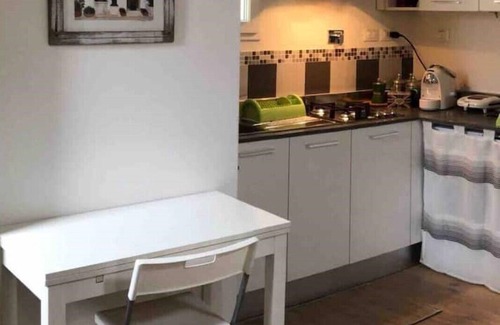 Historic Center Apartment | Prime Location: Steps from the Two Towers with Family Perks