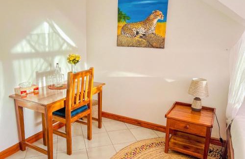 Arusha Hotel | Discover Heart of Africa Lodge: Pet-Friendly Retreat with Pool